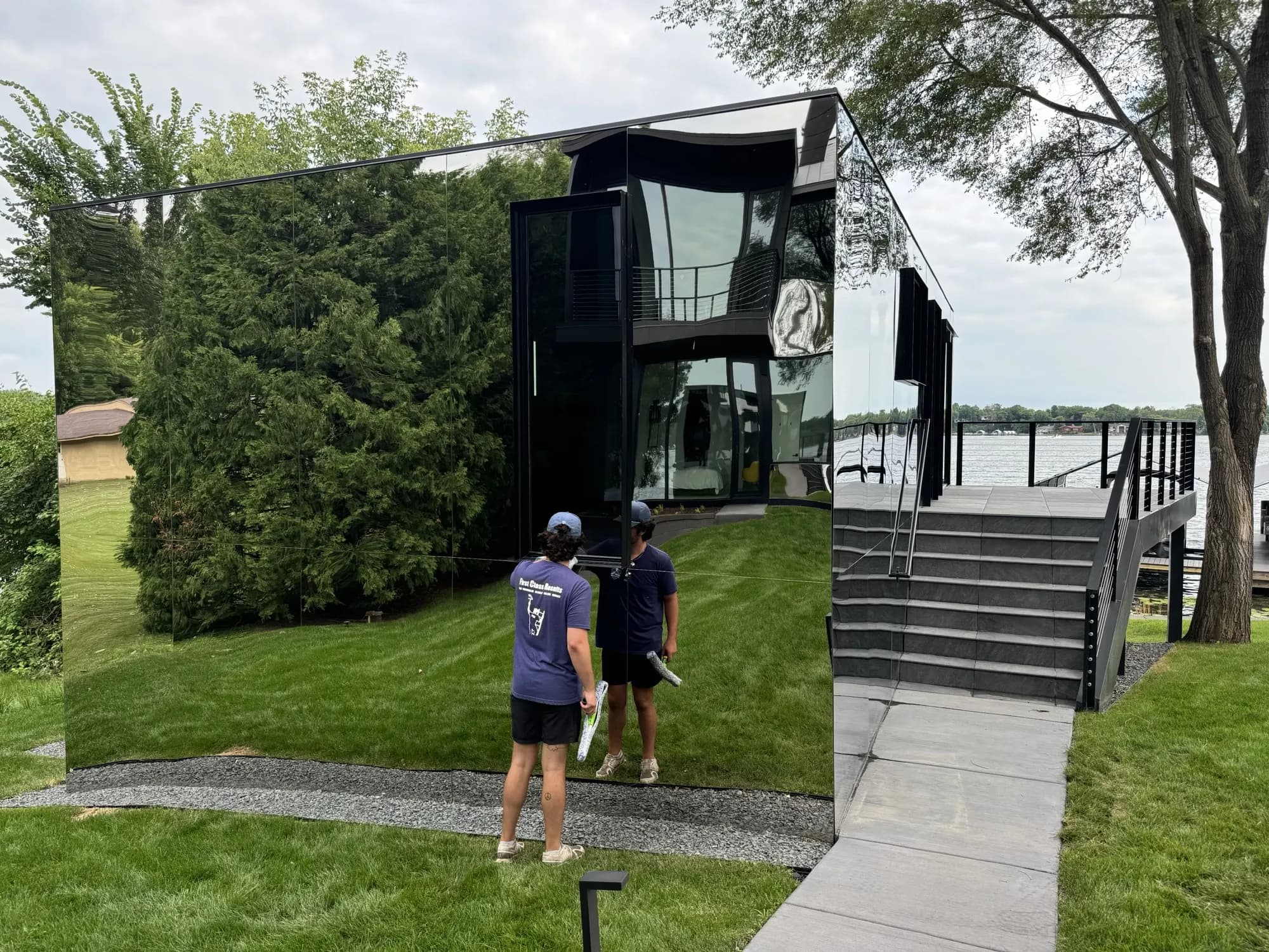 FCR crew at a full-glass lakefront boathouse with mirror-clean windows